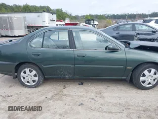 2001 Nissan Altima GXE with VIN 1N4DL01D81C149403, listed as a IAAI auction lot 41619291 with 317,984 mi miles. Bid and sale history available at carsss.com. Image 13.