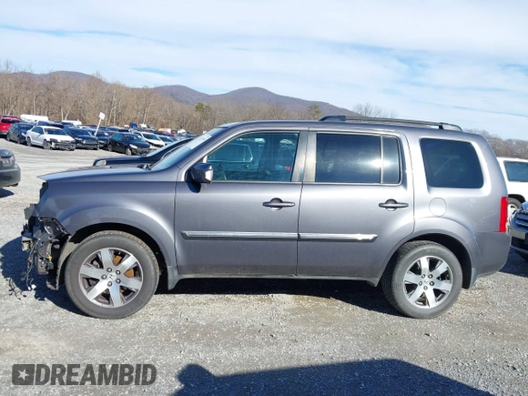 2014 Honda Pilot Touring with VIN 5FNYF4H95EB019048, listed as a IAAI auction lot 41526958 with 172,252 mi miles and . Bid and sale history available at DreamBid. Image 14.