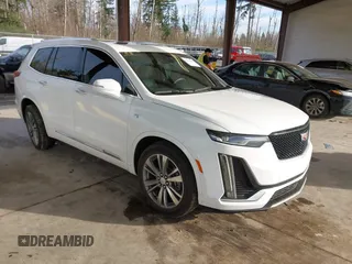 2020 Cadillac XT6 FWD Premium Luxury with VIN 1GYKPCRS3LZ137180, listed as a IAAI auction lot 41680583 with 68,937 mi miles. Bid and sale history available at carsss.com. Image 1.