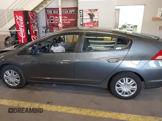 2010 Honda Insight LX with VIN JHMZE2H54AS040316, listed as a IAAI auction lot 41572246 with 142,850 mi miles and . Bid and sale history available at DreamBid. Image 14.