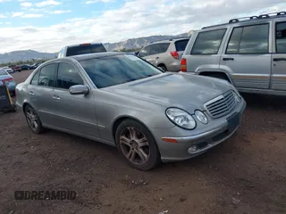 2004 Mercedes-Benz E-Class 5.0L with VIN WDBUF70J14A522118, listed as a IAAI auction lot 41786440 with 153,325 mi miles. Bid and sale history available at carsss.com. Image 1.