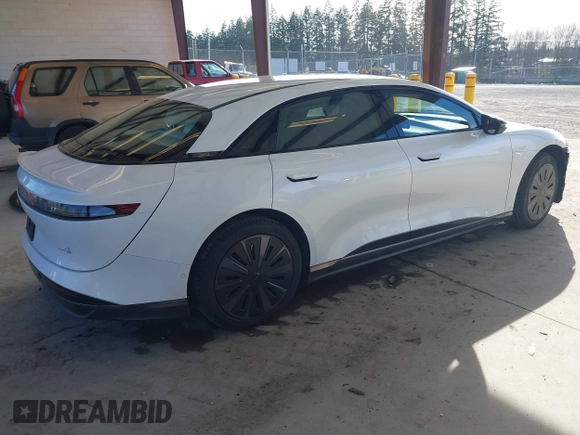 2024 Lucid Air Pure with VIN 50EA1PGA1RA007535, listed as a IAAI auction lot 41879547 with 2,497 mi miles. Bid and sale history available at carsss.com. Image 4.