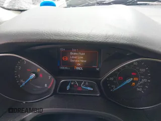 2016 Ford Focus SE z VIN 1FADP3F22GL373756, wystawiony jako IAAI lot #42369795 z przebiegiem 99 646 mil mil oraz . Historia ofert i sprzedaży dostępna na DreamBid. Obrazek 7.