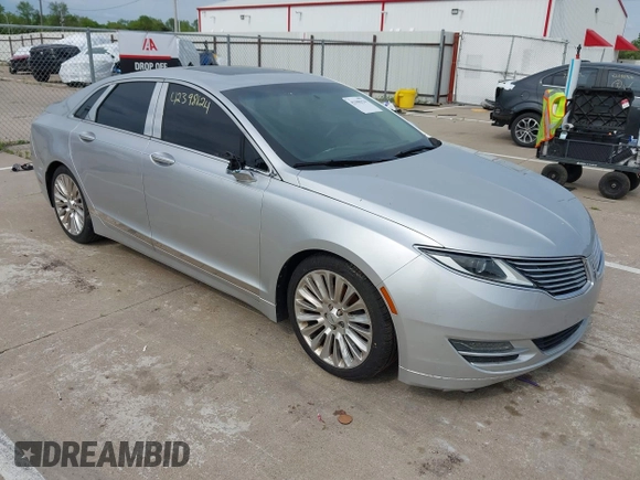 2013 Lincoln MKZ z VIN 3LN6L2G95DR828063, wystawiony jako IAAI lot #42398124 z przebiegiem 158 626 mil mil oraz . Historia ofert i sprzedaży dostępna na DreamBid. Obrazek 1.