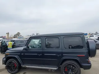 2021 Mercedes-Benz G 63 AMG z VIN W1NYC7HJ2MX423006, wystawiony jako IAAI lot #42170637 z przebiegiem 11 910 mil mil oraz . Historia ofert i sprzedaży dostępna na DreamBid. Obrazek 13.