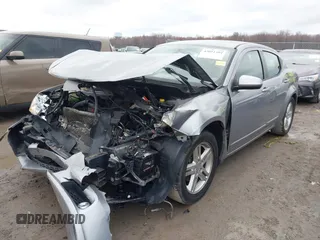 2013 Dodge Avenger SXT with VIN 1C3CDZCB2DN665997, listed as a IAAI auction lot 42011394 with Not Provided miles and . Bid and sale history available at carsss.com. Image 2.