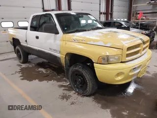 1999 Dodge Ram 2500 with VIN 1B7KF23W3XJ615956, listed as a IAAI auction lot 41880730 with 134,679 mi miles. Bid and sale history available at carsss.com. Image 1.