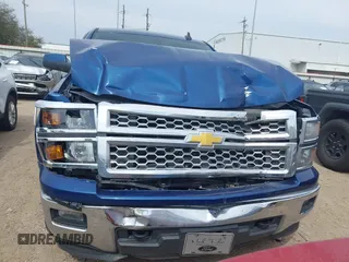 2015 Chevrolet Silverado 1500 LT with VIN 1GCVKREC9FZ179148, listed as a IAAI auction lot 41668536 with 103,853 mi miles and . Bid and sale history available at DreamBid. Image 12.