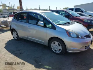2013 Honda Fit with VIN JHMGE8H31DC042192, listed as a IAAI auction lot 42036582 with 63,223 mi miles. Bid and sale history available at carsss.com. Image 1.