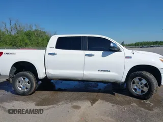 2012 Toyota Tundra 4WD Truck LTD with VIN 5TFHW5F1XCX269682, listed as a IAAI auction lot 41968019 with 166,074 mi miles. Bid and sale history available at carsss.com. Image 14.