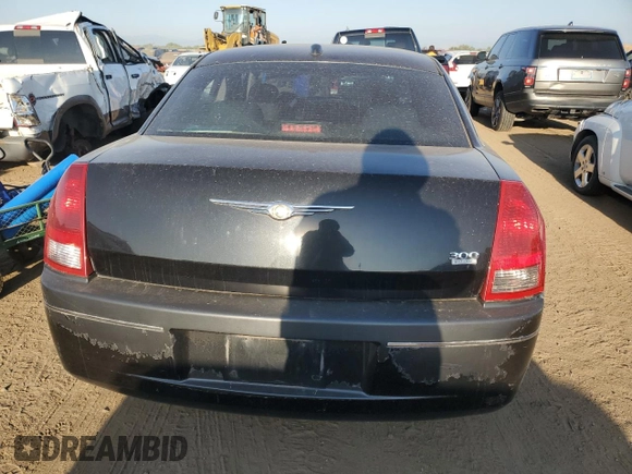 2006 Chrysler 300 Touring with VIN 2C3LA53G06H125654, listed as a Copart auction lot 71224414 with 145,759 mi miles and Salvage Title. Bid and sale history available at carsss.com. Image 6.