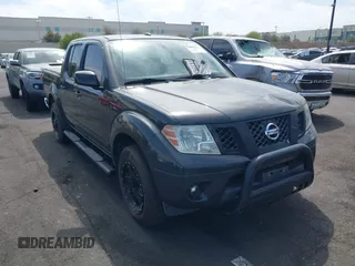 2014 Nissan Frontier SV with VIN 1N6AD0ER8EN756702, listed as a IAAI auction lot 42021294 with 135,143 mi miles and . Bid and sale history available at DreamBid. Image 14.