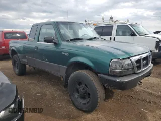 2000 Ford Ranger XL with VIN 1FTZR15VXYPB87516, listed as a Copart auction lot 52945795 with 165,652 mi miles and Salvage title. Bid and sale history available at DreamBid. Image 4.