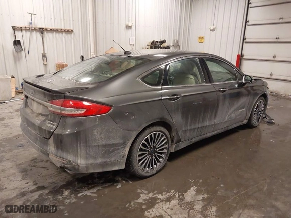 2018 Ford Fusion Hybrid Titanium with VIN 3FA6P0RU4JR147831, listed as a IAAI auction lot 41586033 with 101,088 mi miles. Bid and sale history available at carsss.com. Image 4.