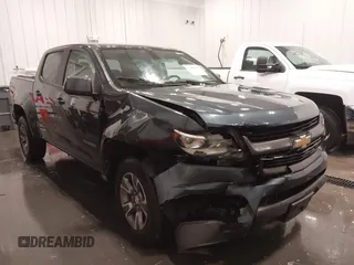 2020 Chevrolet Colorado 4WD Z71 with VIN 1GCGTDEN1L1163546, listed as a IAAI auction lot 41706719 with 64,662 mi miles and . Bid and sale history available at DreamBid. Image 6.