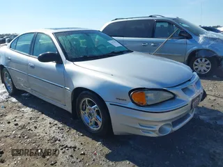 2003 Pontiac Grand Am GT with VIN 1G2NW52E13M612218, listed as a IAAI auction lot 41478495 with 242,179 mi miles. Bid and sale history available at carsss.com. Image 1.