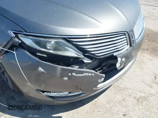 2014 Lincoln MKZ z VIN 3LN6L2G92ER835456, wystawiony jako IAAI lot #41985573 z przebiegiem 174 080 mil mil oraz . Historia ofert i sprzedaży dostępna na DreamBid. Obrazek 6.