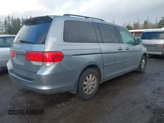 2010 Honda Odyssey EX-L with VIN 5FNRL3H70AB027137, listed as a IAAI auction lot 41659981 with 202,256 mi miles and . Bid and sale history available at DreamBid. Image 4.