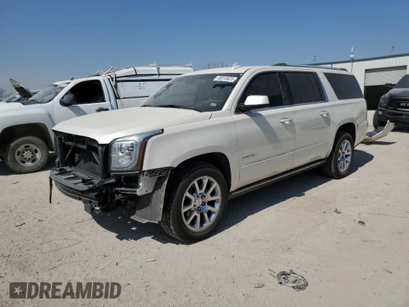 2015 GMC Yukon XL Denali with VIN 1GKS2JKJ3FR585809, listed as a Copart auction lot 48219925 with 191,102 mi miles and Salvage Title. Bid and sale history available at DreamBid. Image 1.