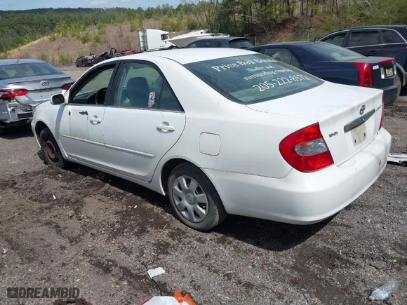 2004 Toyota Camry LE with VIN JTDBE32KX40275598, listed as a IAAI auction lot 41834154 with 343,417 mi miles. Bid and sale history available at carsss.com. Image 3.