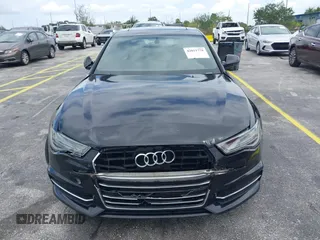 2016 Audi A6 2.0T Premium Plus with VIN WAUGFAFC6GN055826, listed as a IAAI auction lot 42011778 with 98,210 mi miles. Bid and sale history available at carsss.com. Image 12.