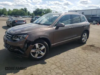 2012 Volkswagen Touareg Lux with VIN WVGEK9BP1CD006512, listed as a Copart auction lot 58614845 with 139,861 mi miles and Salvage title. Bid and sale history available at DreamBid. Image 1.