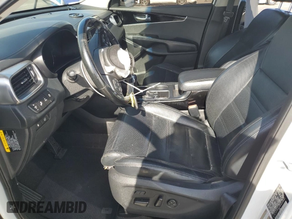 2017 Kia Sorento SXL z VIN 5XYPK4A54HG250891, wystawiony jako Copart lot #57791565 z przebiegiem Nie podano mil oraz Szkoda całkowita • Salvage title. Historia ofert i sprzedaży dostępna na DreamBid. Obrazek 7.