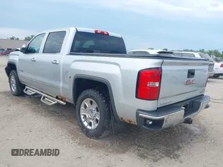 2014 GMC Sierra 1500 SLT with VIN 3GTU2VEC2EG100051, listed as a IAAI auction lot 40363924 with 149,636 mi miles and . Bid and sale history available at DreamBid. Image 3.