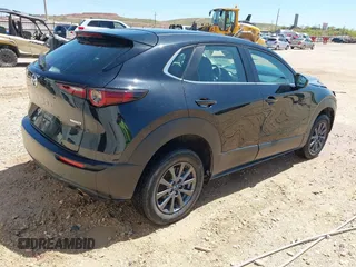 2023 Mazda CX-30 S with VIN 3MVDMBAM8PM548451, listed as a IAAI auction lot 41972170 with 36,379 mi miles and . Bid and sale history available at carsss.com. Image 4.