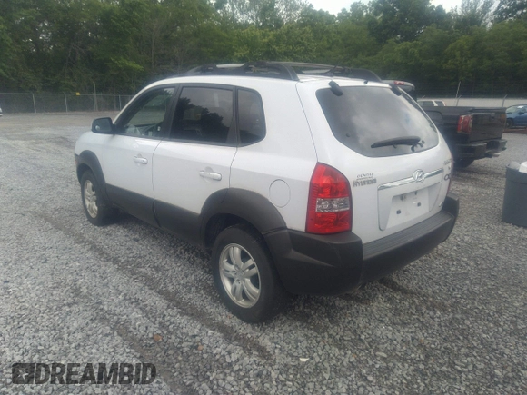 2007 Hyundai Tucson SE with VIN KM8JN72D97U485574, listed as a IAAI auction lot 42180222 with 128,098 mi miles and . Bid and sale history available at DreamBid. Image 3.