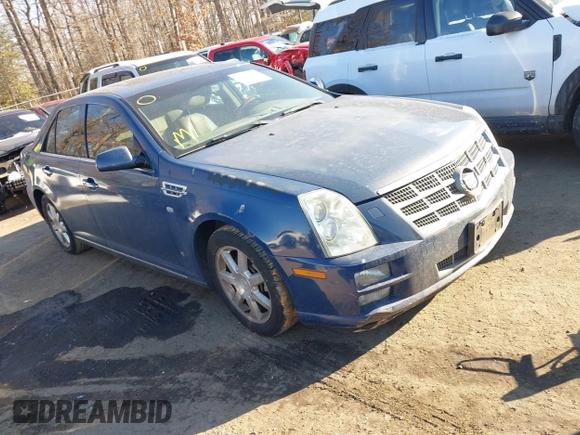 2009 Cadillac STS AWD w/1SB with VIN 1G6DD67VX90130281, listed as a IAAI auction lot 41384191 with 102,943 mi miles. Bid and sale history available at carsss.com. Image 1.