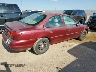1999 Ford Contour LX with VIN 1FAFP66L2XK167281, listed as a Copart auction lot 64839335 with 256,227 mi miles and Clean title. Bid and sale history available at DreamBid. Image 3.