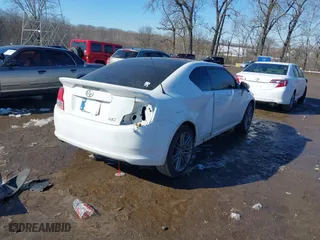 2012 Scion tC with VIN JTKJF5C70C3031365, listed as a IAAI auction lot 41607290 with 241,183 mi miles. Bid and sale history available at carsss.com. Image 4.