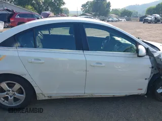 2014 Chevrolet Cruze 1LT with VIN 1G1PC5SB4E7481461, listed as a IAAI auction lot 42628673 with 164,689 mi miles and . Bid and sale history available at DreamBid. Image 13.