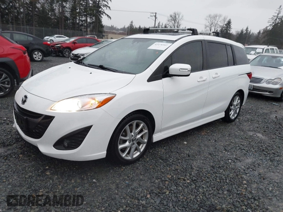 2015 Mazda Mazda5 Grand Touring with VIN JM1CW2DL6F0185594, listed as a IAAI auction lot 41470568 with 116,309 mi miles. Bid and sale history available at carsss.com. Image 17.