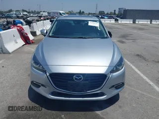 2018 Mazda 3 Touring z VIN 3MZBN1V35JM272638, wystawiony jako IAAI lot #42458722 z przebiegiem 98 393 mil mil oraz . Historia ofert i sprzedaży dostępna na DreamBid. Obrazek 12.