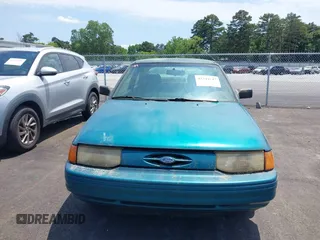 1994 Ford Escort z VIN 1FARP11J7RW270259, wystawiony jako IAAI lot #42341647 z przebiegiem 74 472 mil mil oraz . Historia ofert i sprzedaży dostępna na DreamBid. Obrazek 6.