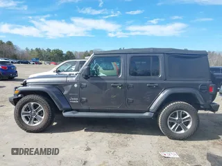2018 Jeep Wrangler Unlimited Sahara with VIN 1C4HJXEG0JW246110, listed as a IAAI auction lot 41826662 with 65,236 mi miles. Bid and sale history available at carsss.com. Image 14.