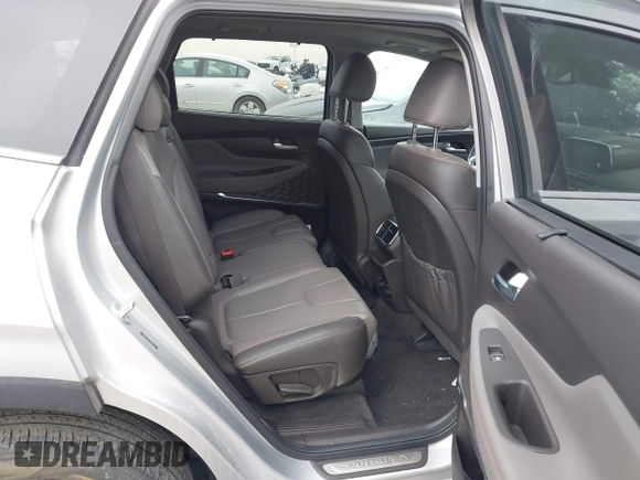 2019 Hyundai Santa Fe Ultimate with VIN 5NMS5CAD1KH000394, listed as a IAAI auction lot 41455421 with 42,886 mi miles and . Bid and sale history available at DreamBid. Image 8.