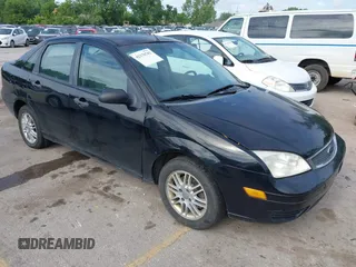 2007 Ford Focus S z VIN 1FAHP34N37W161610, wystawiony jako IAAI lot #42370742 z przebiegiem Nie podano mil oraz . Historia ofert i sprzedaży dostępna na DreamBid. Obrazek 1.