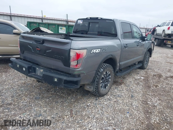 2021 Nissan Titan Pro-4X with VIN 1N6AA1ED3MN531332, listed as a IAAI auction lot 41918065 with 125,323 mi miles and . Bid and sale history available at DreamBid. Image 4.