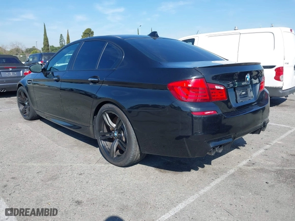 2013 BMW M5 with VIN WBSFV9C54DC772568, listed as a IAAI auction lot 41866486 with 99,072 mi miles. Bid and sale history available at carsss.com. Image 3.