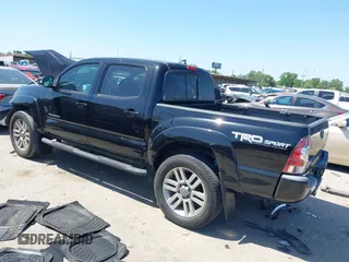 2014 Toyota Tacoma PreRunner with VIN 3TMJU4GN0EM160403, listed as a IAAI auction lot 41979894 with 169,941 mi miles. Bid and sale history available at carsss.com. Image 3.