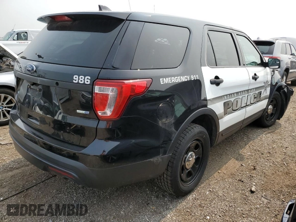 2017 Ford Police Interceptor Utility with VIN 1FM5K8AR4HGE02145, listed as a Copart auction lot 60424045 with Not provided miles and Salvage title. Bid and sale history available at DreamBid. Image 3.