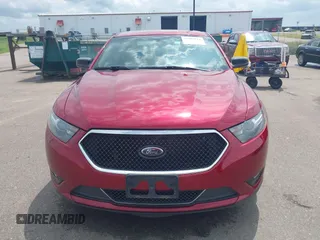 2014 Ford Taurus SHO with VIN 1FAHP2KT1EG133940, listed as a IAAI auction lot 42805214 with 141,204 mi miles and . Bid and sale history available at DreamBid. Image 12.