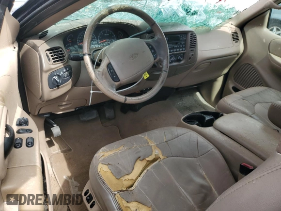 1999 Ford F-250 z VIN 1FTPX28L2XKA25212, wystawiony jako Copart lot #74911064 z przebiegiem Nie podano mil oraz Szkoda całkowita • Salvage title. Historia ofert i sprzedaży dostępna na DreamBid. Obrazek 8.