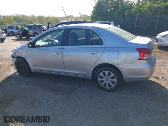 2009 Toyota Yaris with VIN JTDBT903891307874, listed as a IAAI auction lot 42150366 with 218,350 mi miles. Bid and sale history available at carsss.com. Image 3.