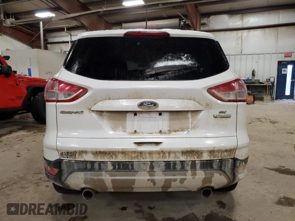 2013 Ford Escape SE with VIN 1FMCU0GX3DUA49482, listed as a Copart auction lot 85415084 with 131,056 mi miles and Salvage Title. Bid and sale history available at DreamBid. Image 6.
