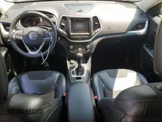 2015 Jeep Cherokee Trailhawk with VIN 1C4PJMBS6FW785891, listed as a Copart auction lot 61040565 with 156,421 mi miles and Clean title. Bid and sale history available at DreamBid. Image 8.