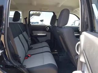2007 Dodge Nitro SLT z VIN 1D8GT58K27W578490, wystawiony jako IAAI lot #42335125 z przebiegiem 125 826 mil mil oraz . Historia ofert i sprzedaży dostępna na DreamBid. Obrazek 8.